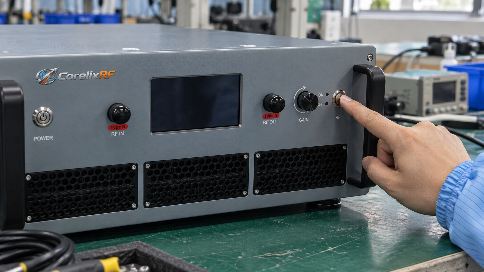 Technician operating the RF control on a CorelixRF amplifier during an unpowered switching-sequence setup